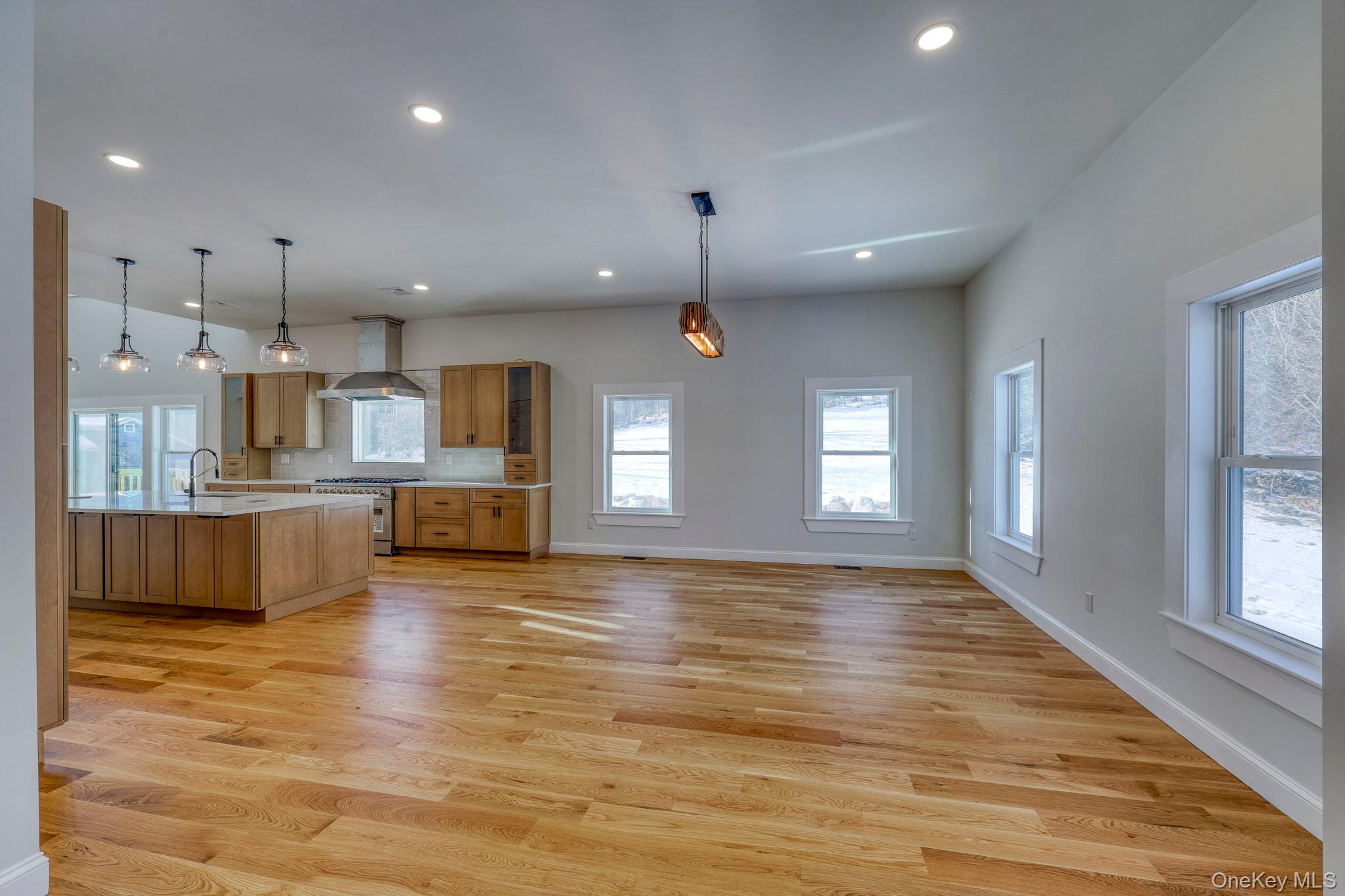 133 West Mombasha Road Monroe, NY 10950 - Photo 8 of 42 a view of kitchen with kitchen island sink refrigerator and window
