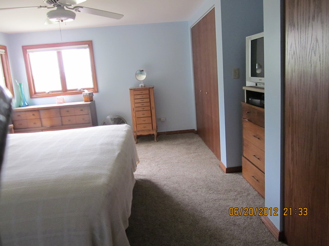 18444 University Road Malta, IL 60150 - Photo 20 of 25 a view of an empty room with a window