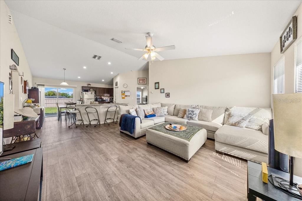 19 Juniper Loop Run Ocala, FL 34480 - Photo 12 of 42 a living room with furniture and kitchen view