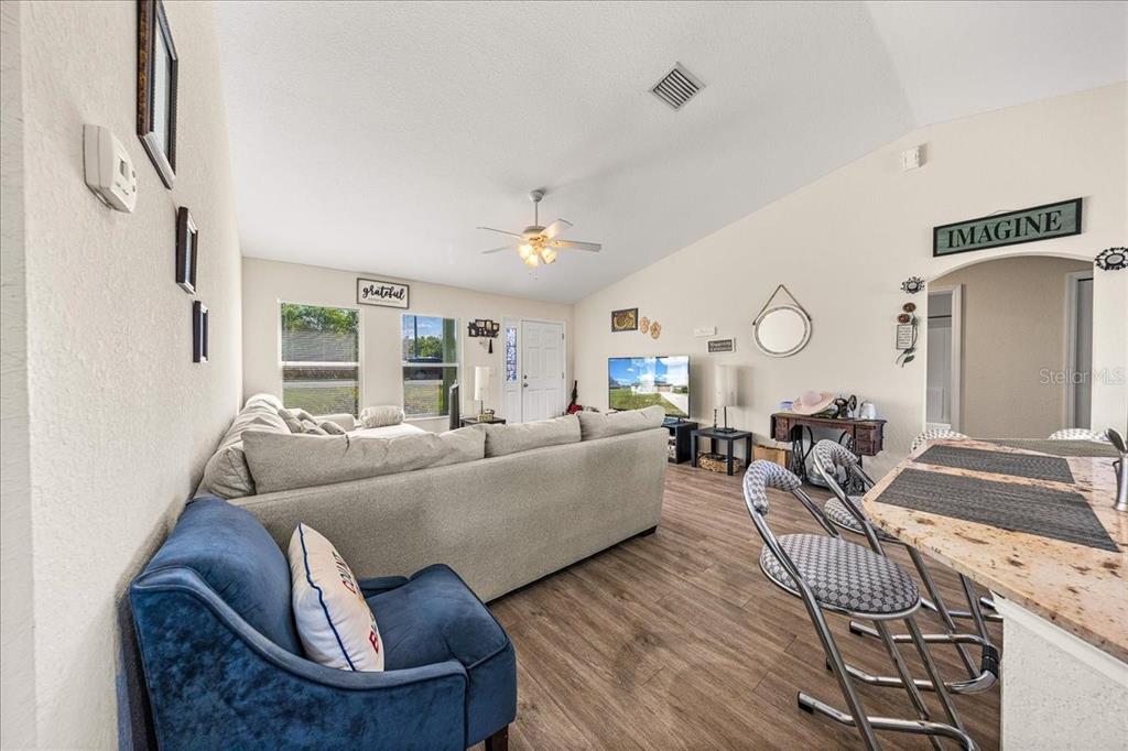 19 Juniper Loop Run Ocala, FL 34480 - Photo 13 of 42 a living room with furniture and a large window