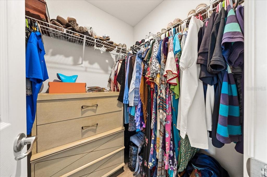 19 Juniper Loop Run Ocala, FL 34480 - Photo 22 of 42 a view of walk in closet with clothes and shoes