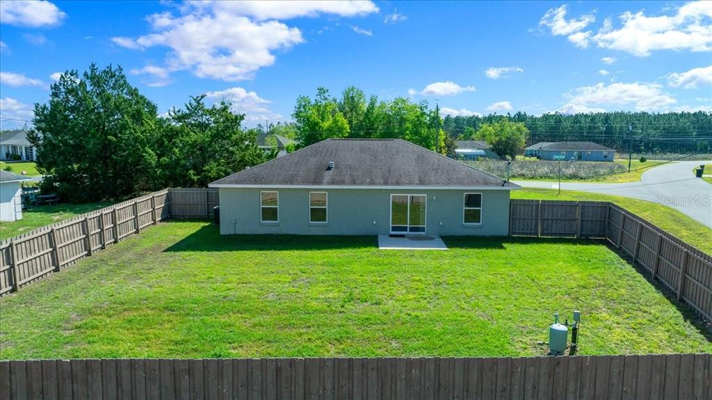19 Juniper Loop Run Ocala, FL 34480 - Photo 25 of 42 a house with swimming pool in front of it