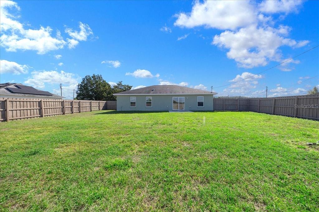 19 Juniper Loop Run Ocala, FL 34480 - Photo 26 of 42 a view of a house with a big yard