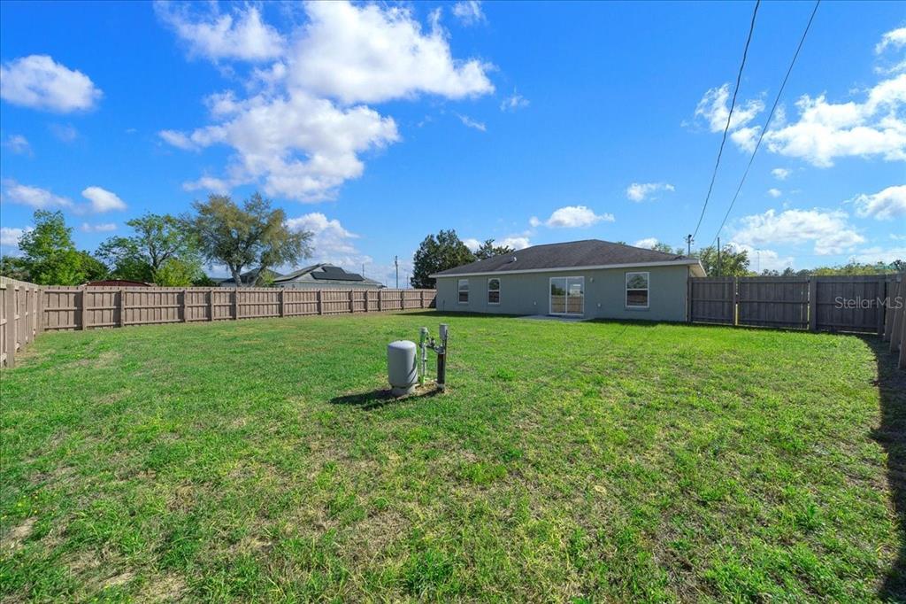 19 Juniper Loop Run Ocala, FL 34480 - Photo 27 of 42 a view of a house with a big yard