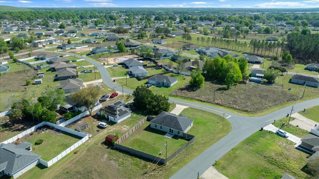 19 Juniper Loop Run Ocala, FL 34480 - Photo 39 of 42 a view of a lake with a house