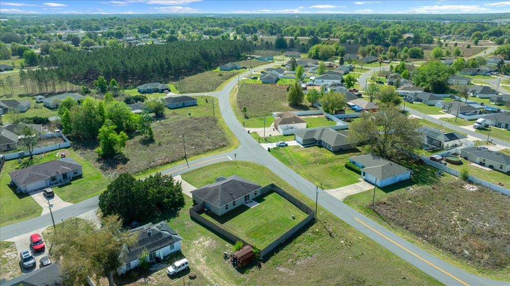19 Juniper Loop Run Ocala, FL 34480 - Photo 41 of 42 a view of a garden with houses