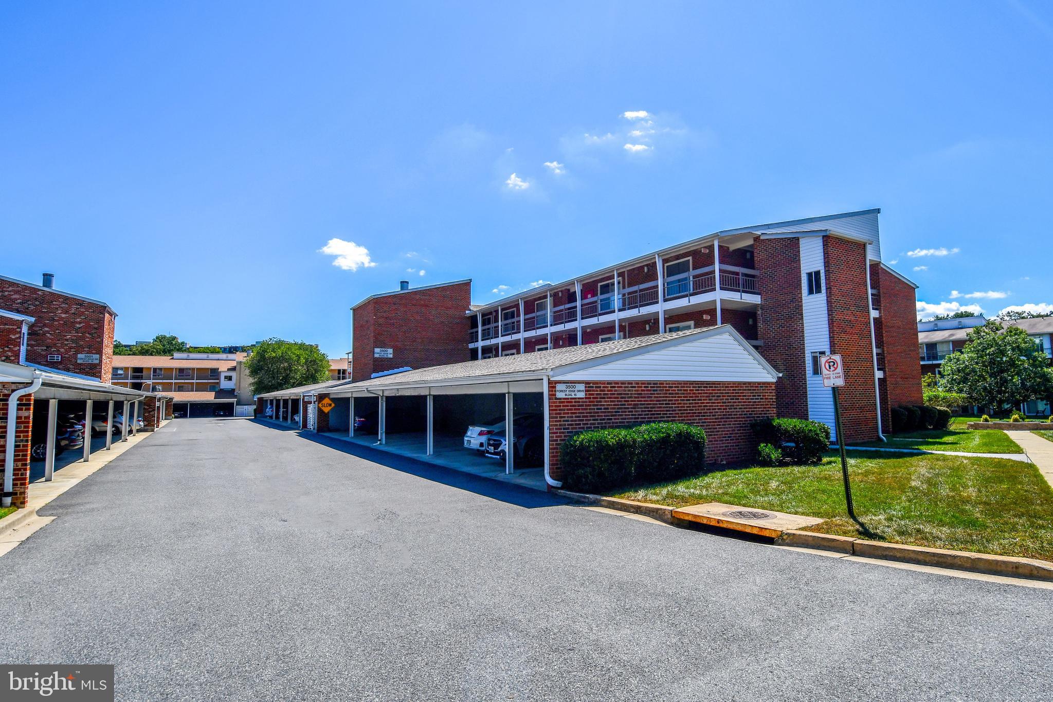 a view of a house with a yard and garage