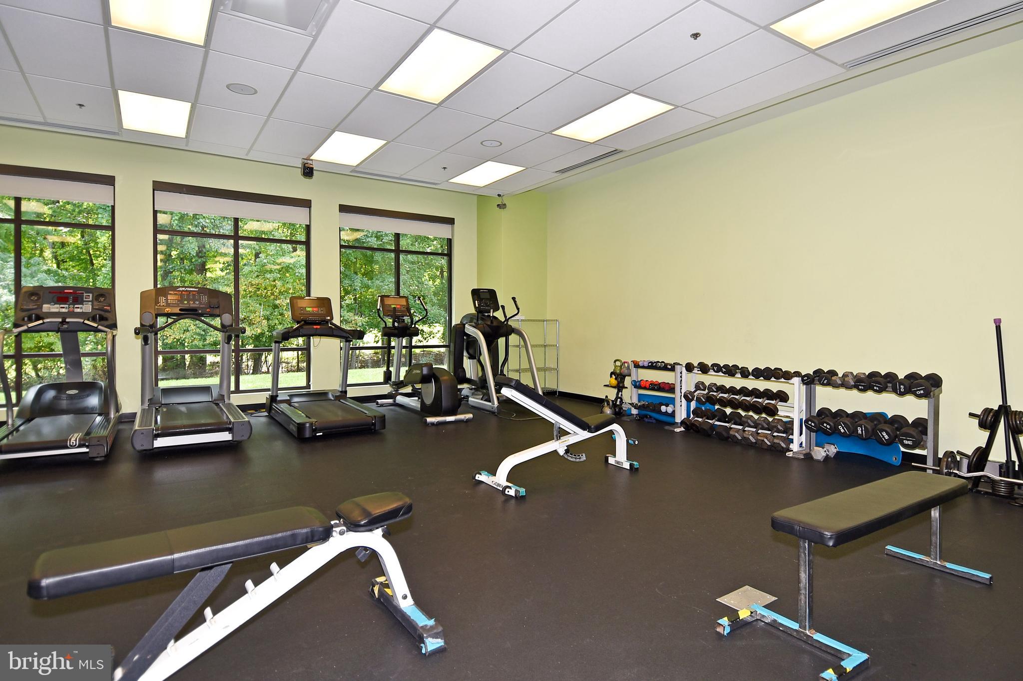 3500 Forest Edge Drive, Unit 152E Silver Spring, MD 20906 - Photo 22 of 33 a view of a room with gym equipment