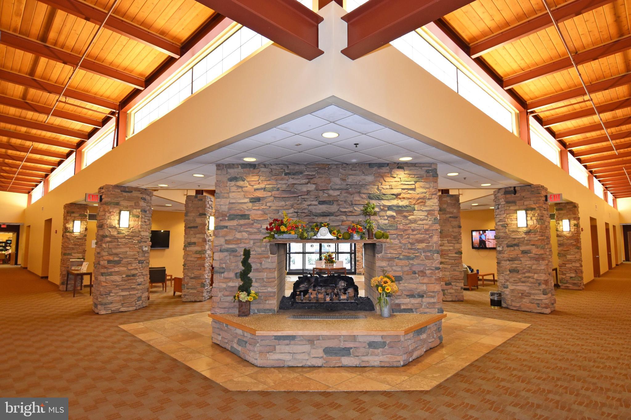 3500 Forest Edge Drive, Unit 152E Silver Spring, MD 20906 - Photo 29 of 33 a view of a hall with a building