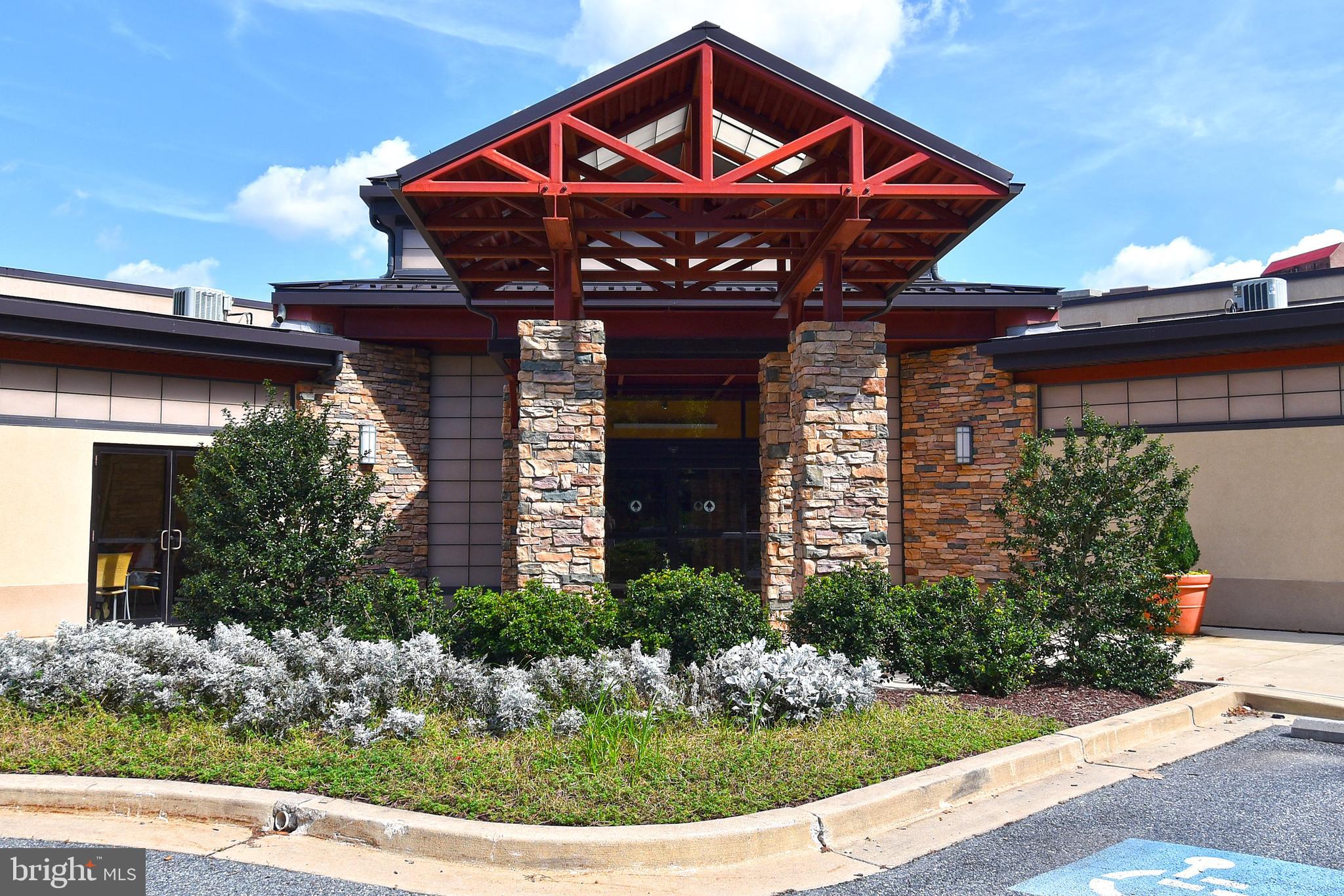 3500 Forest Edge Drive, Unit 152E Silver Spring, MD 20906 - Photo 30 of 33 a front view of a house with garden