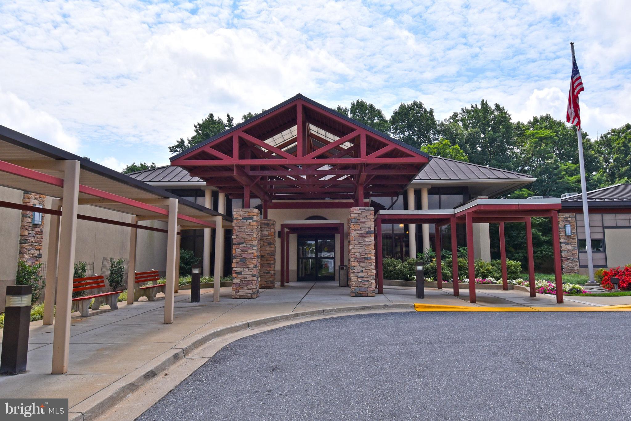 3500 Forest Edge Drive, Unit 152E Silver Spring, MD 20906 - Photo 31 of 33 a front view of a building with small garden