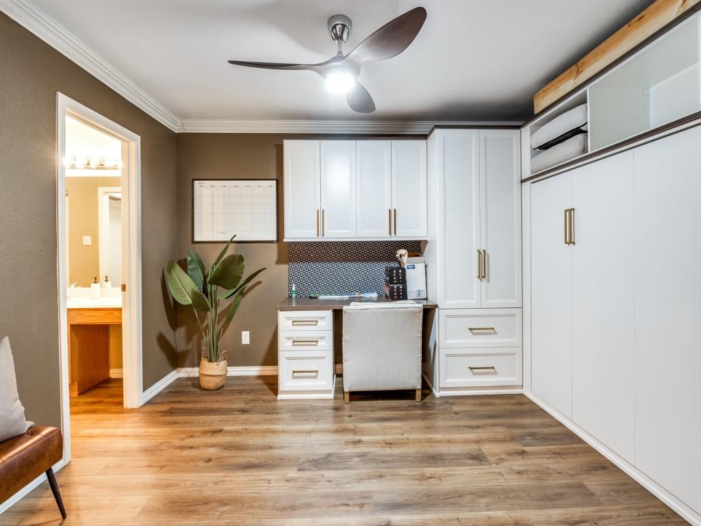 18040 Midway Road, Unit 189 Dallas, TX 75287 - Photo 13 of 28 Office area featuring built in study area, ceiling fan, light wood finished floors, and crown molding