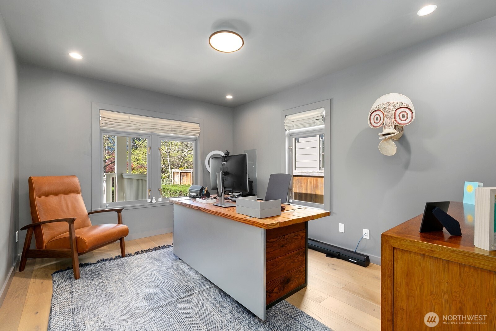 5932 California Avenue Southwest Seattle, WA 98136 - Photo 15 of 35 a living room with furniture and a flat screen tv