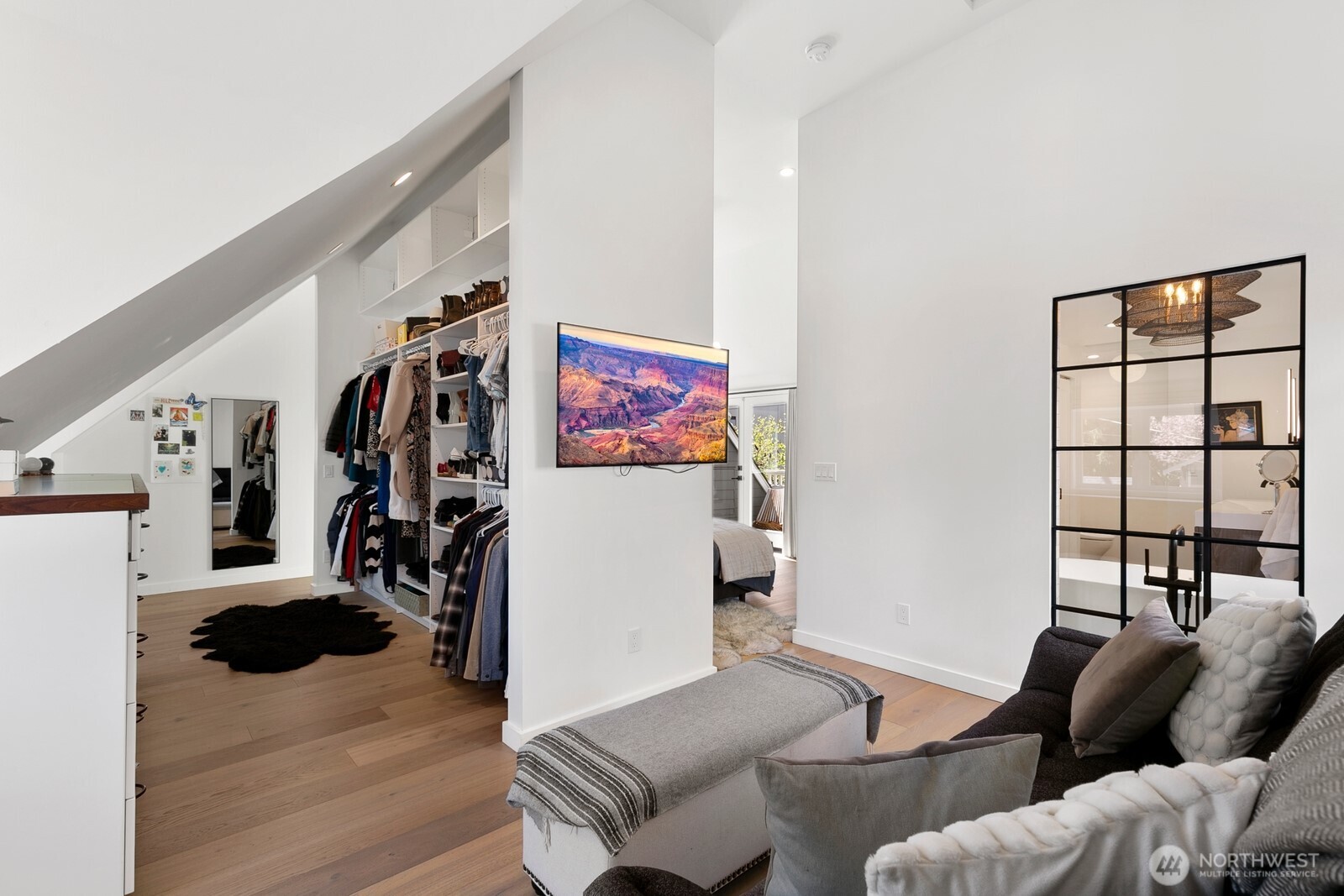 5932 California Avenue Southwest Seattle, WA 98136 - Photo 24 of 35 a living room with furniture and a flat screen tv