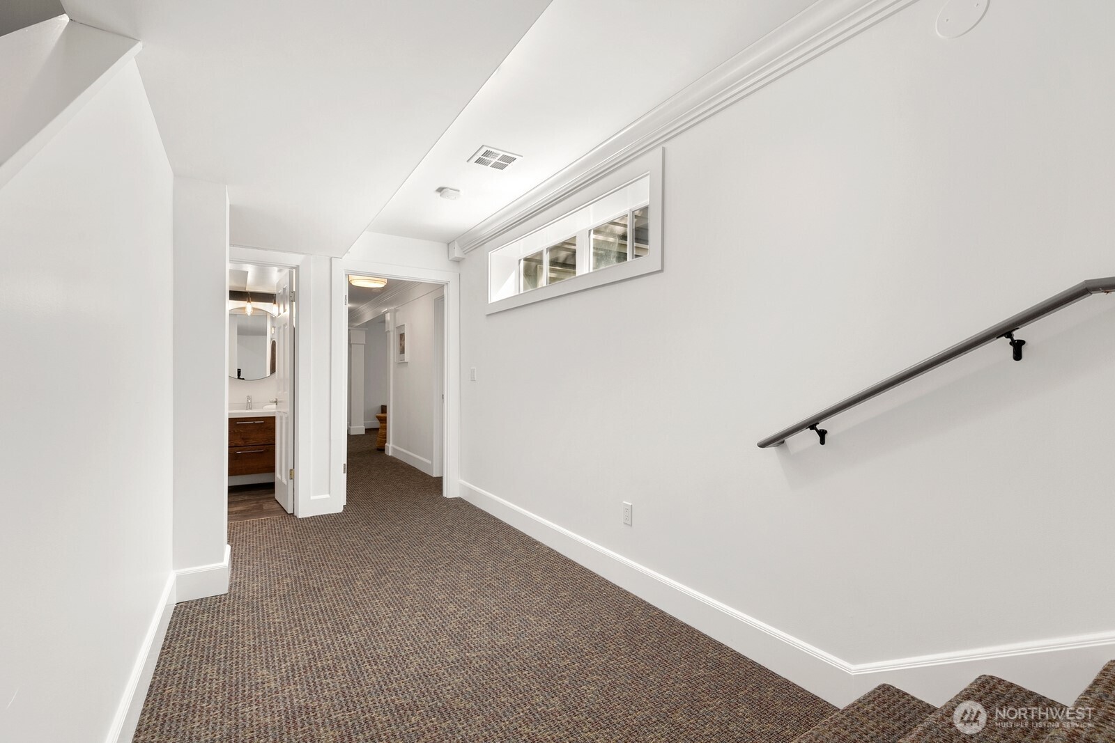 5932 California Avenue Southwest Seattle, WA 98136 - Photo 30 of 35 a view of a big room with closet and windows