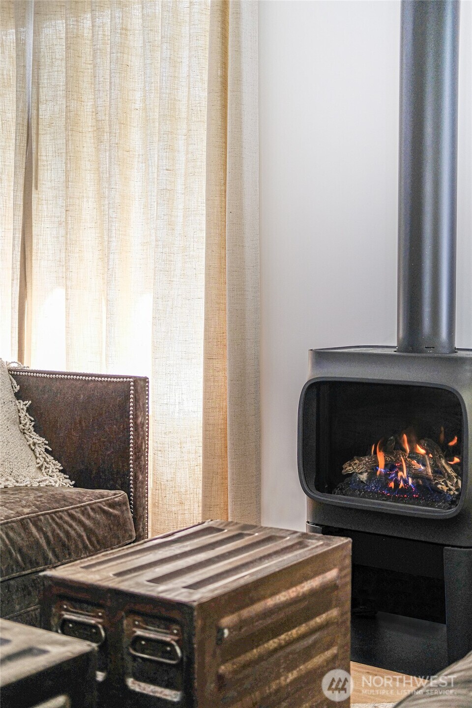 5932 California Avenue Southwest Seattle, WA 98136 - Photo 5 of 35 a living room with furniture and a fireplace