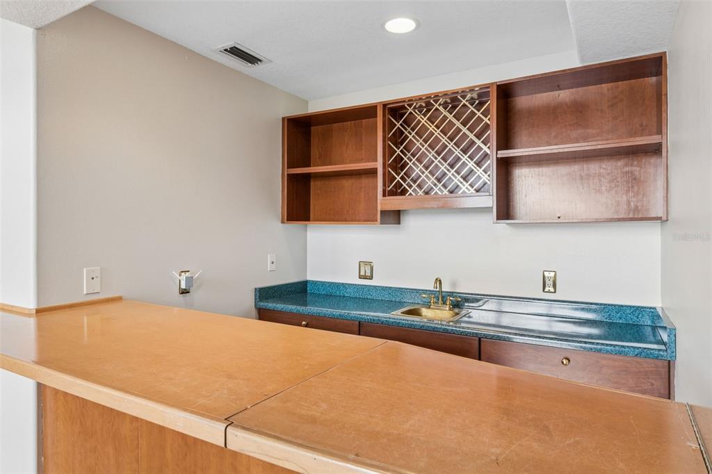 4301 Down Point Lane Windermere, FL 34786 - Photo 19 of 61 a kitchen with a sink and a microwave