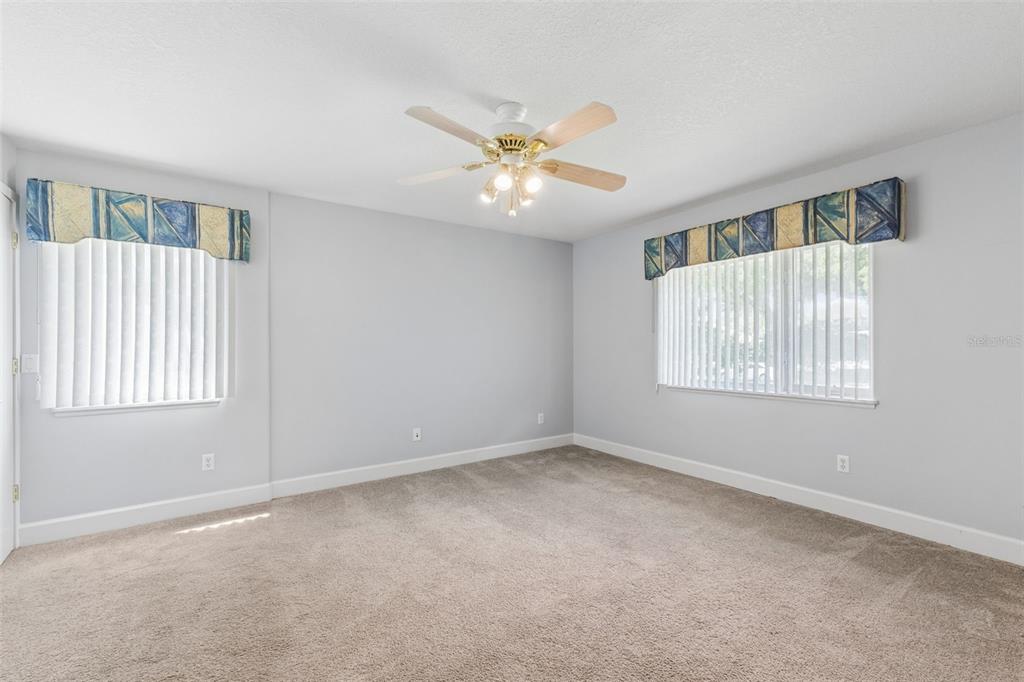 4301 Down Point Lane Windermere, FL 34786 - Photo 29 of 61 a view of an empty room with a window