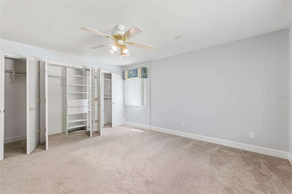 4301 Down Point Lane Windermere, FL 34786 - Photo 30 of 61 an empty room with a empty space and a ceiling fan