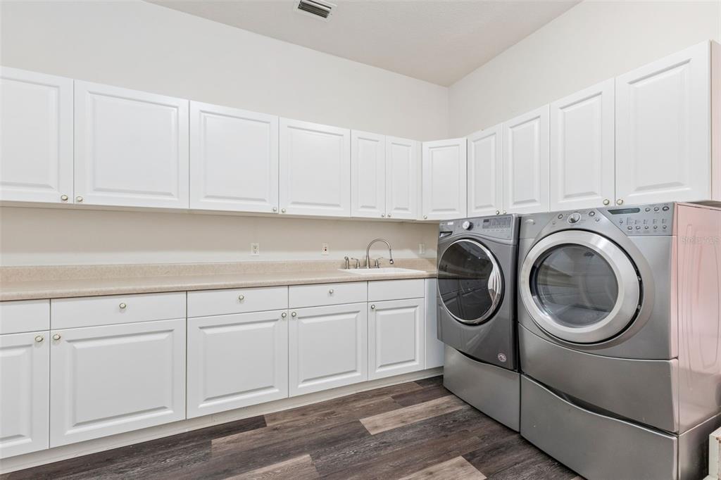4301 Down Point Lane Windermere, FL 34786 - Photo 32 of 61 a utility room with sink dryer and washer