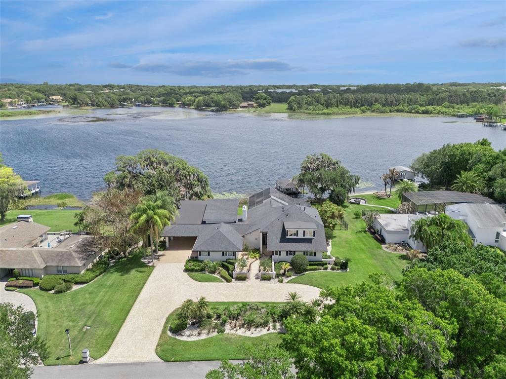 4301 Down Point Lane Windermere, FL 34786 - Photo 55 of 61 an aerial view of a house with a lake view