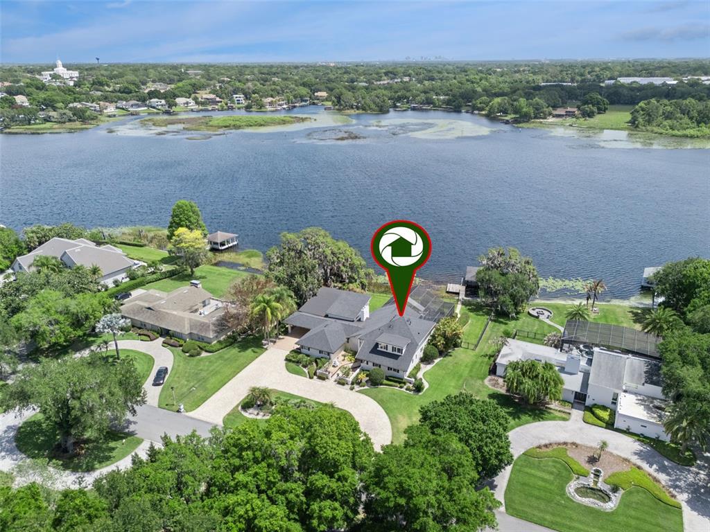 4301 Down Point Lane Windermere, FL 34786 - Photo 59 of 61 an aerial view of a house with a swimming pool