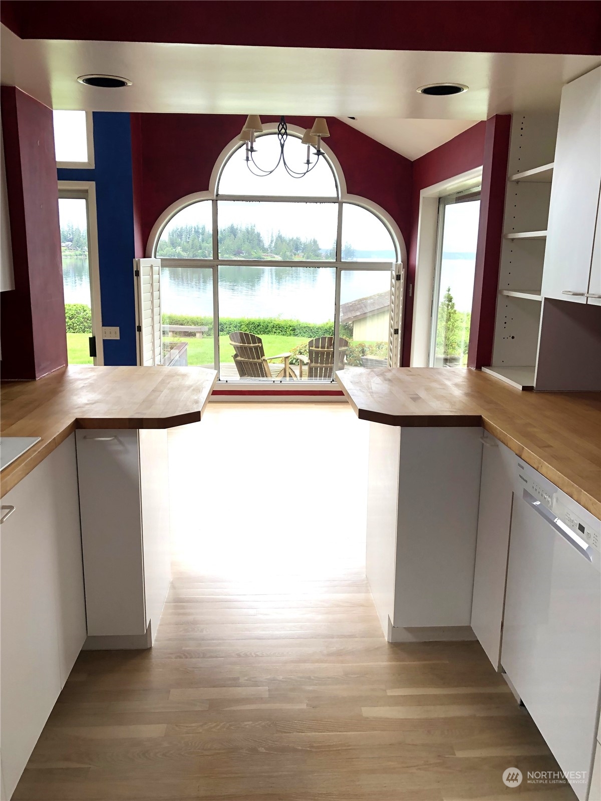 6918 Totem Beach Loop Road Marysville, WA 98271 - Photo 16 of 29 a view of a kitchen with a sink and a large window