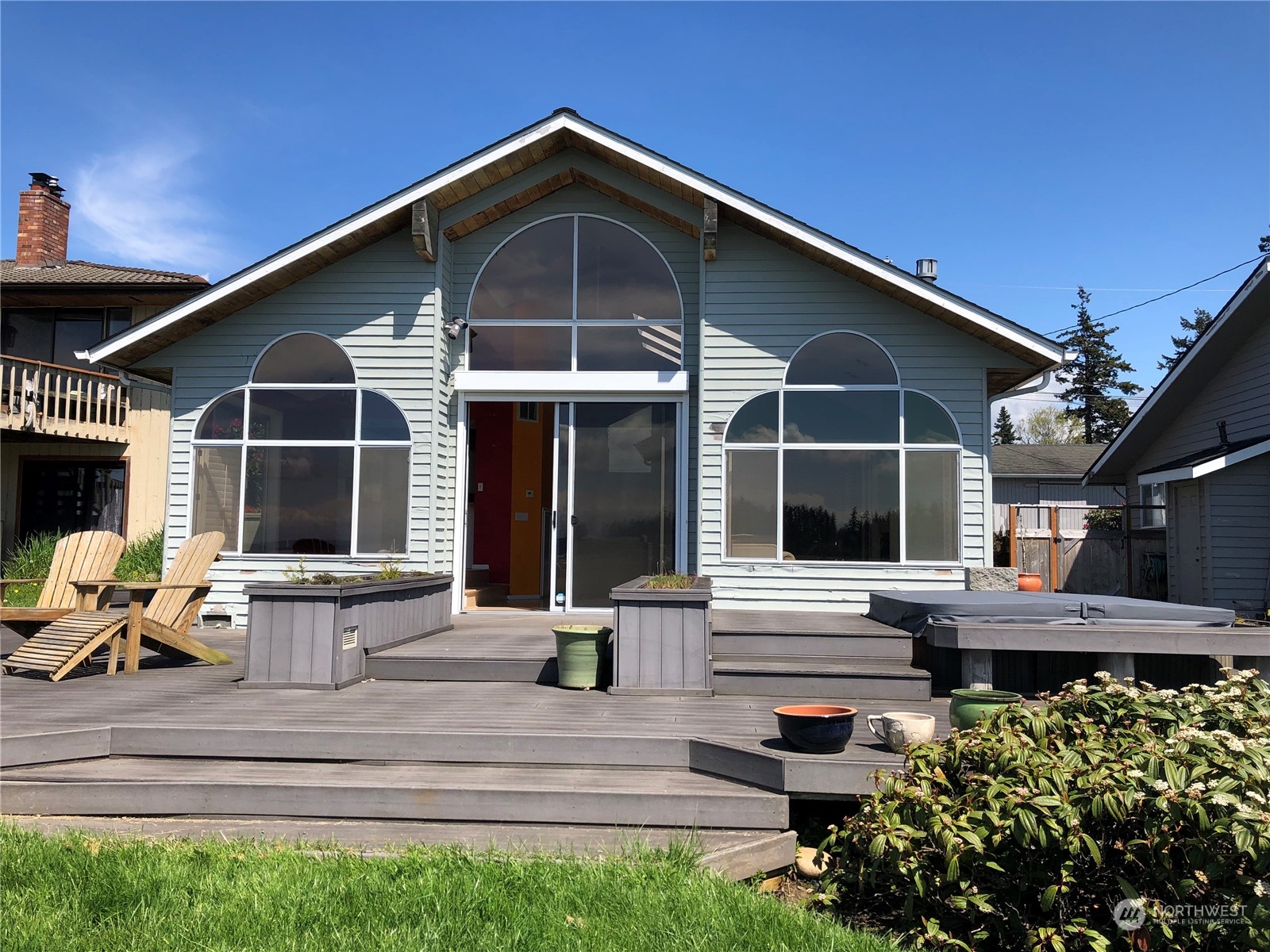 6918 Totem Beach Loop Road Marysville, WA 98271 - Photo 2 of 29 a front view of a house with sitting area
