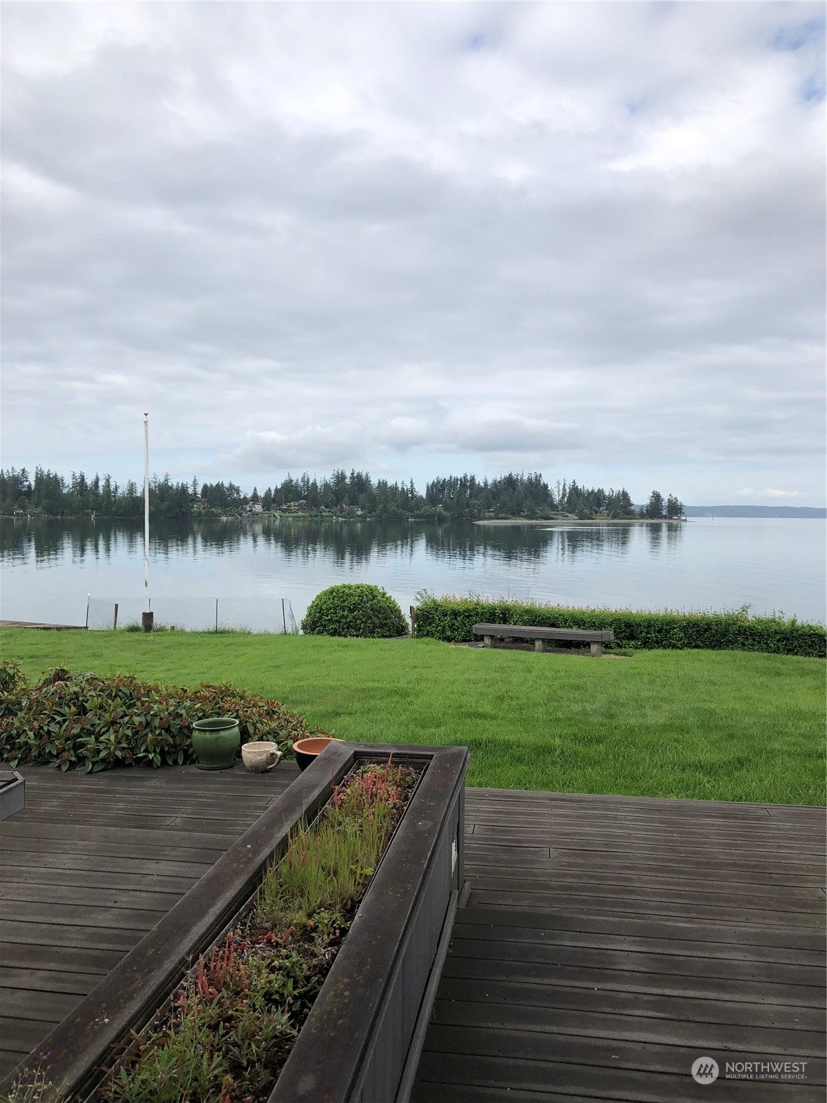 6918 Totem Beach Loop Road Marysville, WA 98271 - Photo 28 of 29 a view of a lake with a big yard