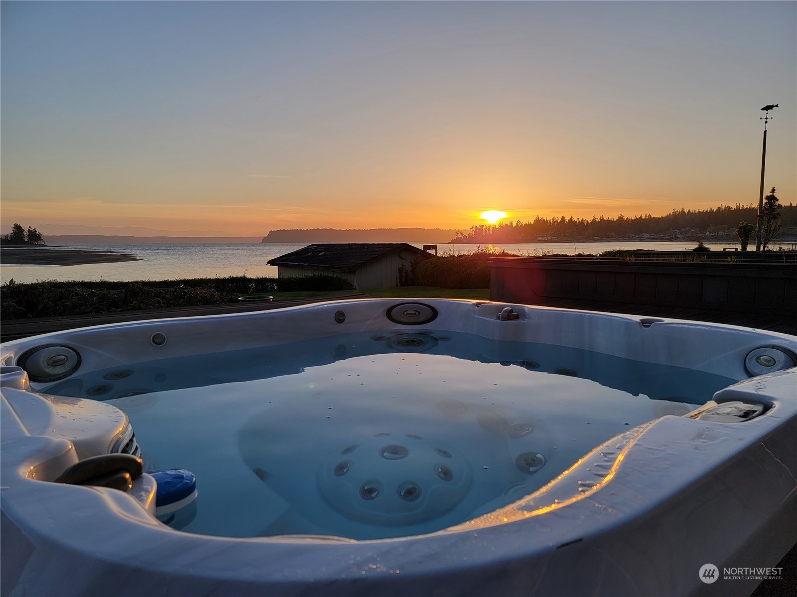 6918 Totem Beach Loop Road Marysville, WA 98271 - Photo 4 of 29 a view of roof deck with sunset view
