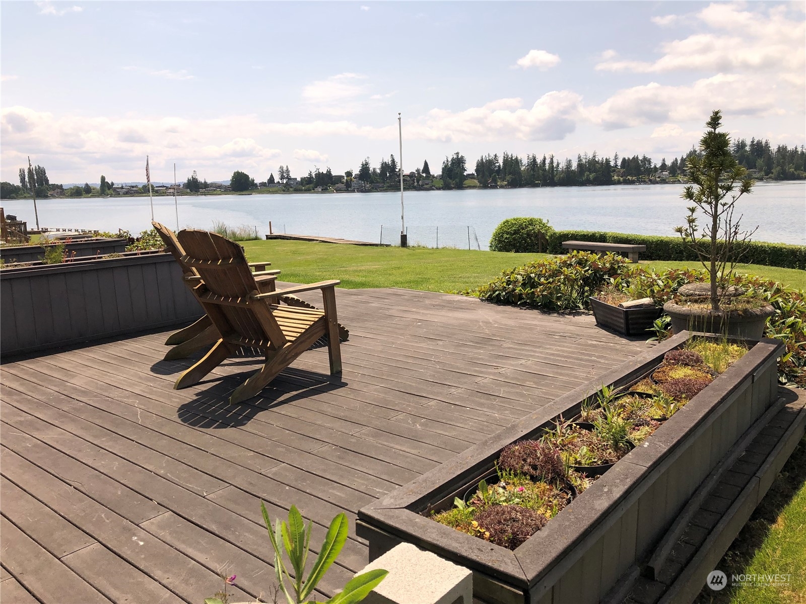 6918 Totem Beach Loop Road Marysville, WA 98271 - Photo 7 of 29 a view of a lake with outdoor seating