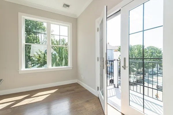 a view of an empty room and window