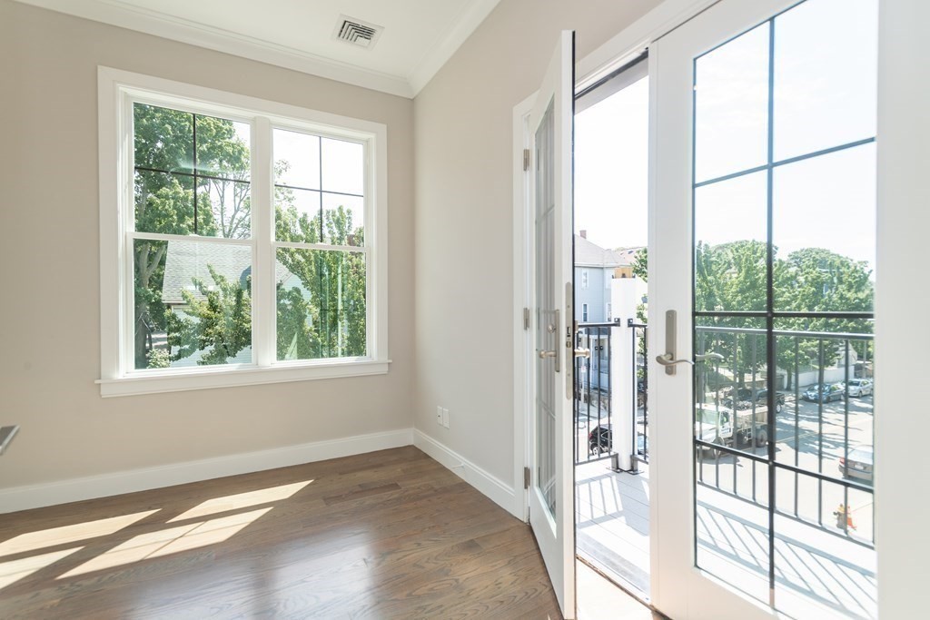 3247 Washington Street, Unit 3 Boston, MA 02130 - Photo 3 of 15 a view of an empty room and window