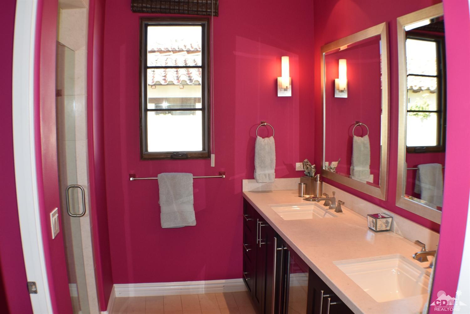 9 Santa Rosa Mountain Lane Rancho Mirage, CA 92270 - Photo 28 of 58 a bathroom with a sink mirror and a bathtub