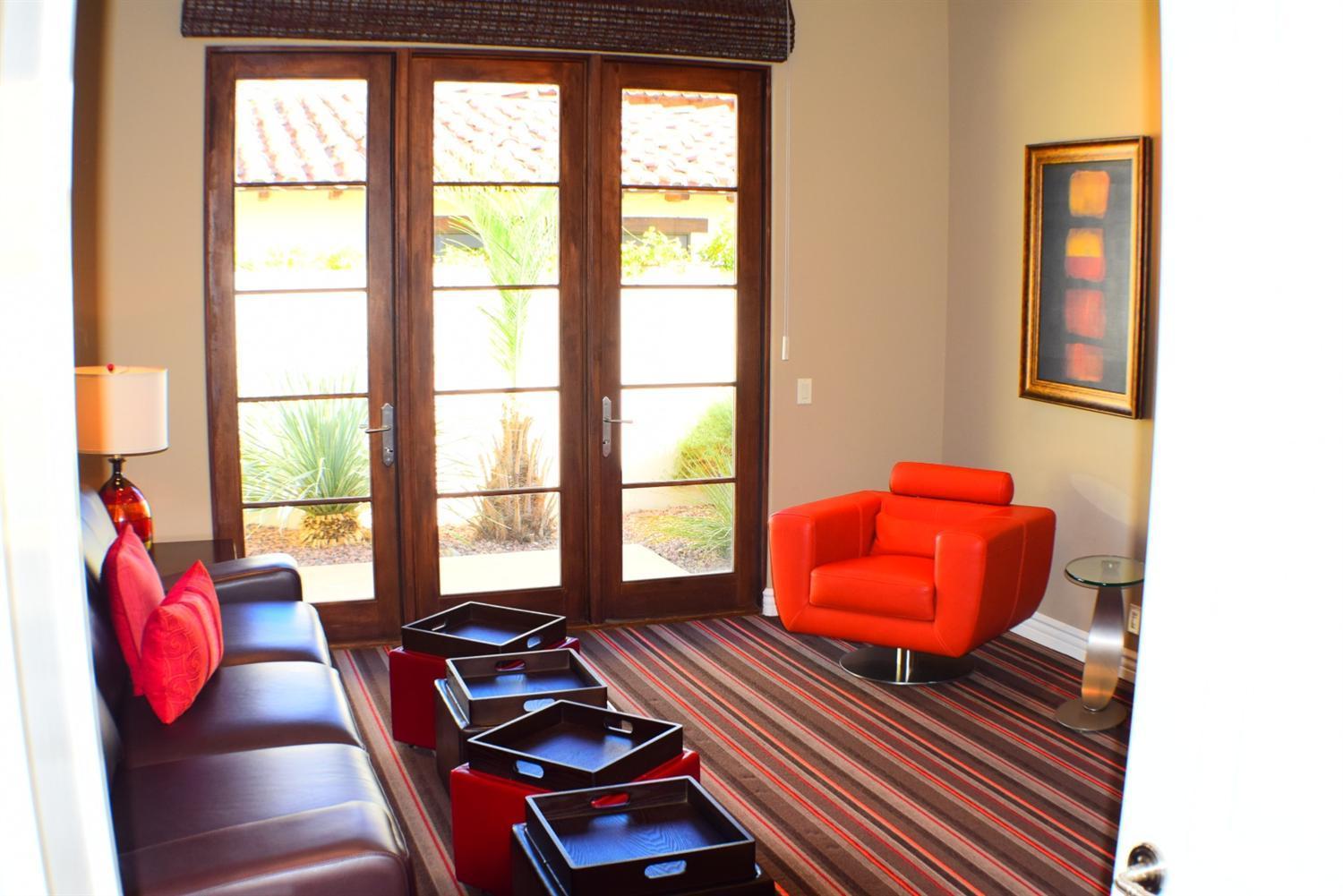 9 Santa Rosa Mountain Lane Rancho Mirage, CA 92270 - Photo 29 of 58 a room with furniture and a window