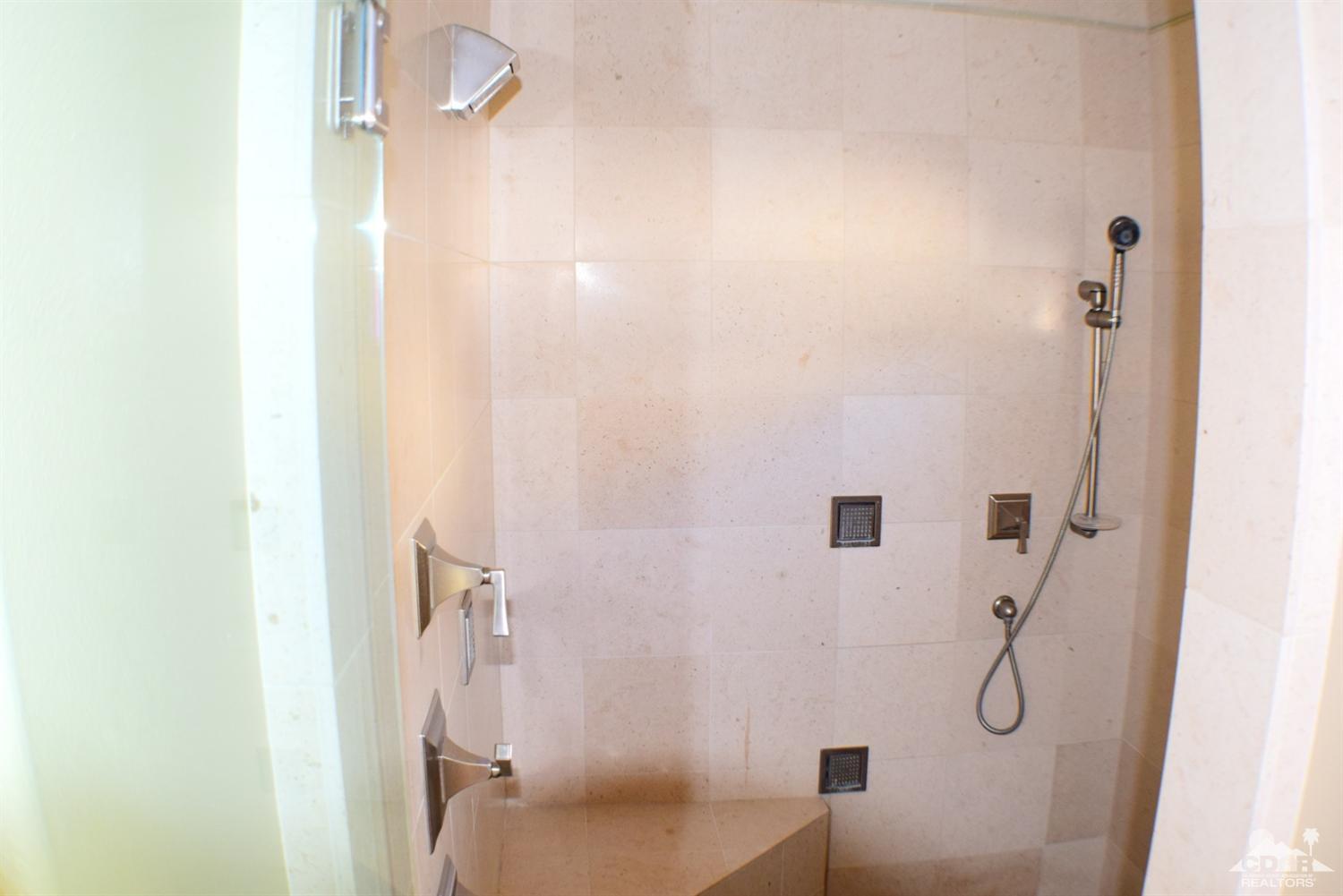 9 Santa Rosa Mountain Lane Rancho Mirage, CA 92270 - Photo 56 of 58 a bathroom with a granite countertop shower