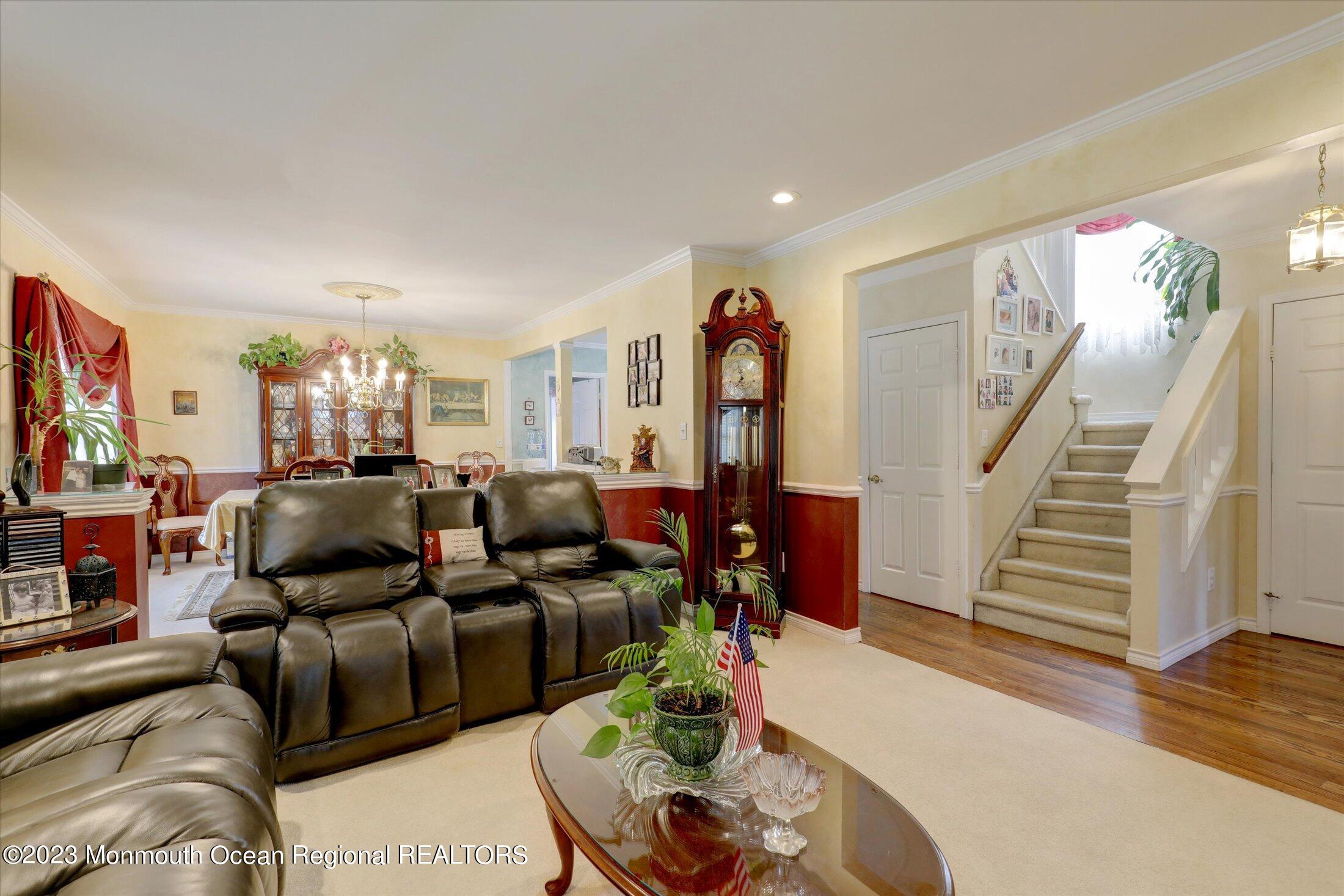 847 Waterworks Road Freehold, NJ 07728 - Photo 12 of 74 a living room with furniture and a flat screen tv