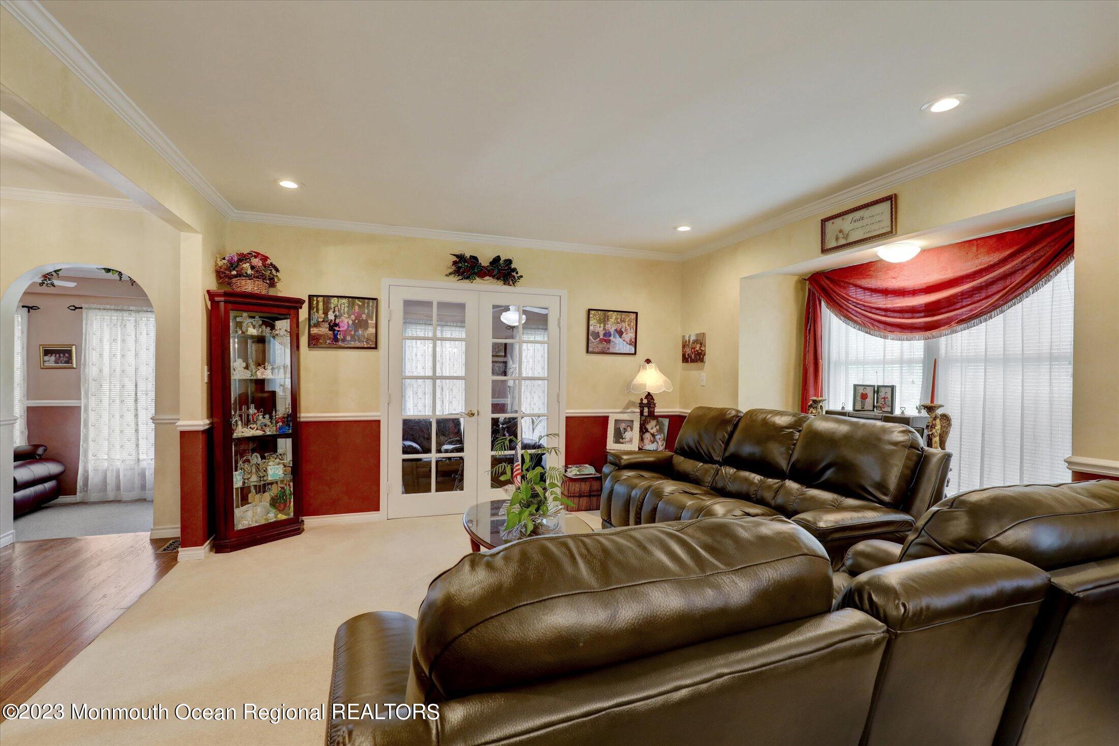 847 Waterworks Road Freehold, NJ 07728 - Photo 13 of 74 a living room with furniture and a wooden floor