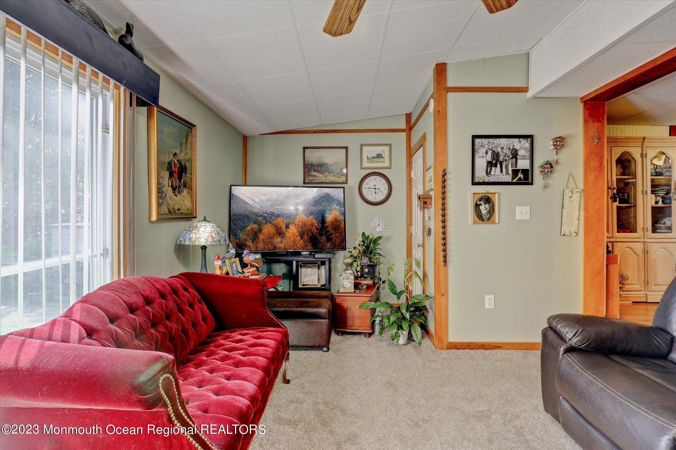 847 Waterworks Road Freehold, NJ 07728 - Photo 43 of 74 a living room with furniture and a window