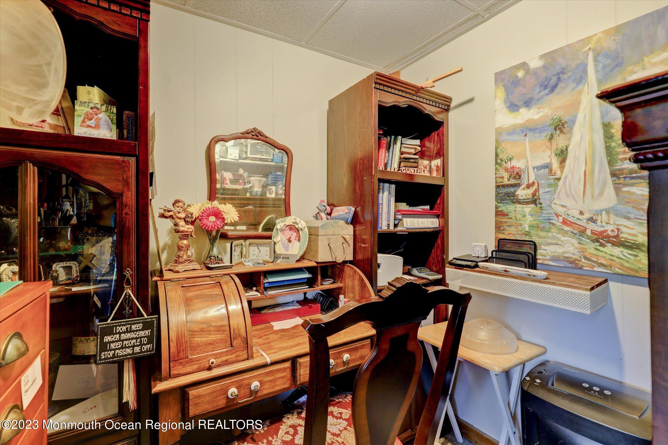 847 Waterworks Road Freehold, NJ 07728 - Photo 47 of 74 a room with furniture and musical instruments