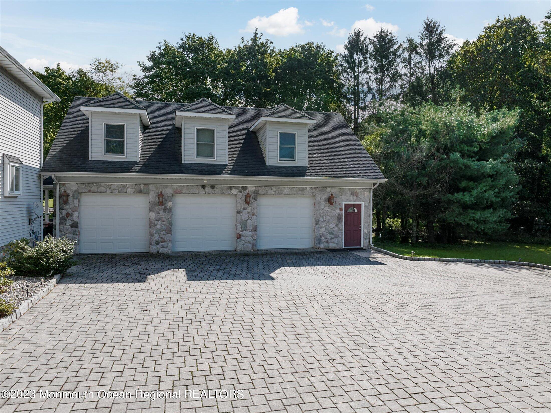 847 Waterworks Road Freehold, NJ 07728 - Photo 50 of 74 a front view of a house with a yard