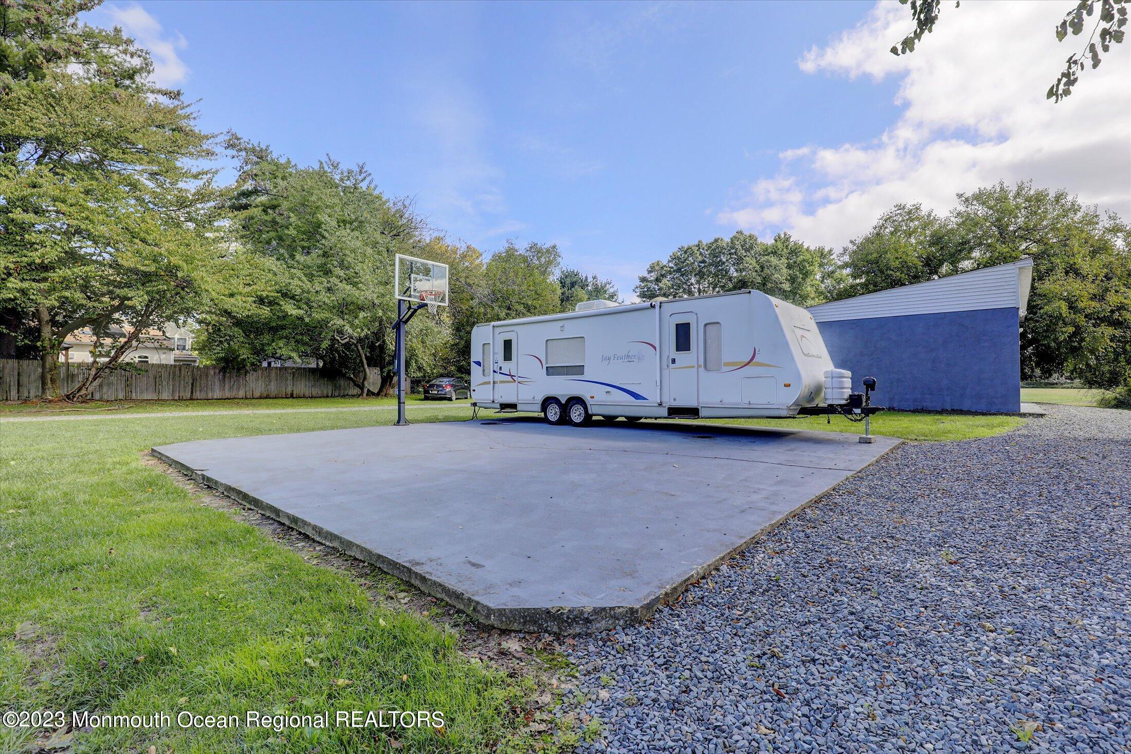 847 Waterworks Road Freehold, NJ 07728 - Photo 62 of 74 a view of a backyard with swimming pool