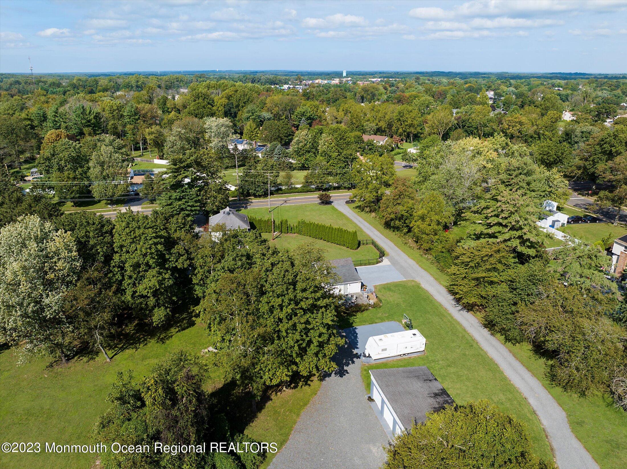 847 Waterworks Road Freehold, NJ 07728 - Photo 69 of 74 a view of a lake with a garden