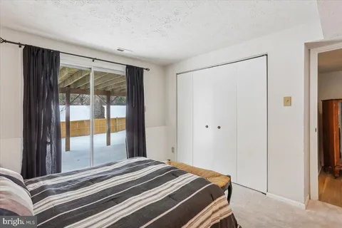 a view of deck with wooden floor and fence