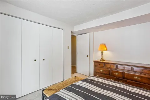 a view of an empty room with a sliding door