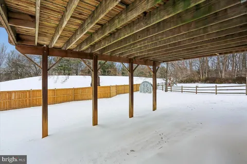 a view of a house with a snow on the wall