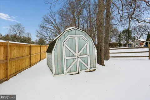 a view of a backyard of the house