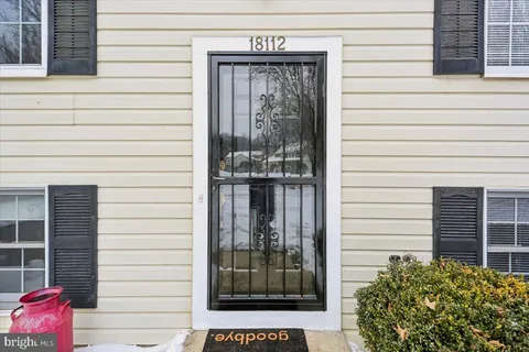 a view of a door and a window
