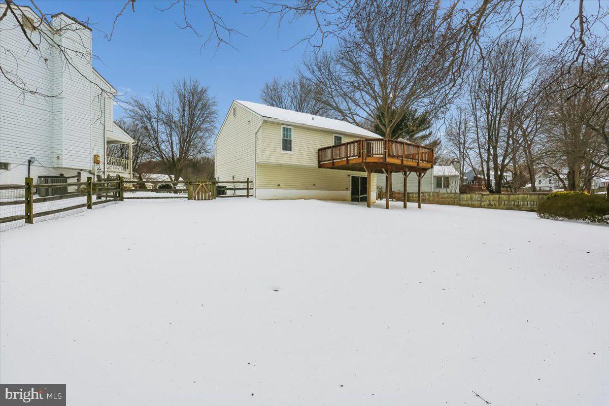 18112 Kodella Court Gaithersburg, MD 20877 - Photo 51 of 60 a view of a house with a snow in a yard