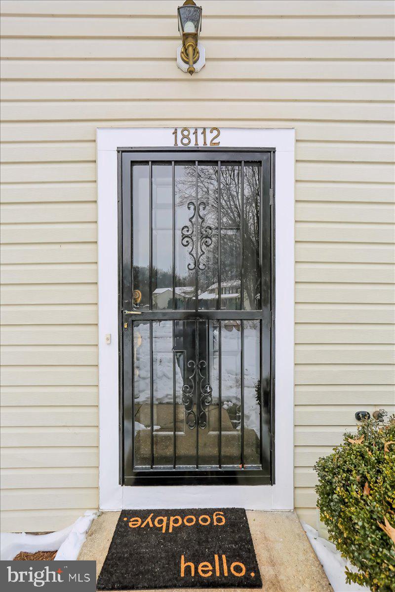 18112 Kodella Court Gaithersburg, MD 20877 - Photo 6 of 60 a view of a door and a window